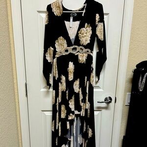 Selling this beautiful and elegant one if a kind hand made dress.